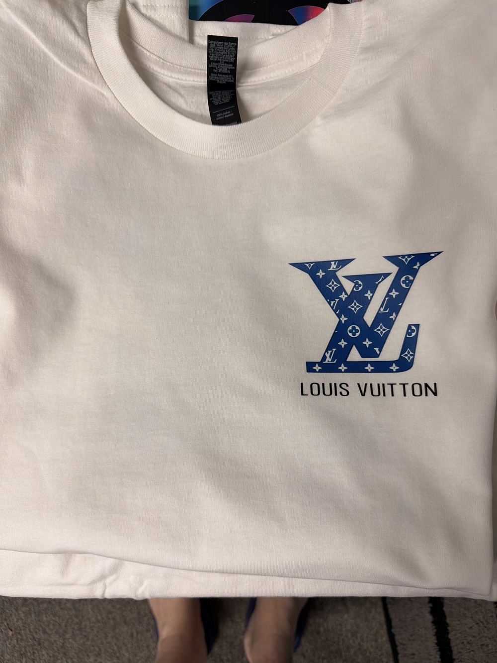 VIP White Tee with Blue Monogram Logo Patch